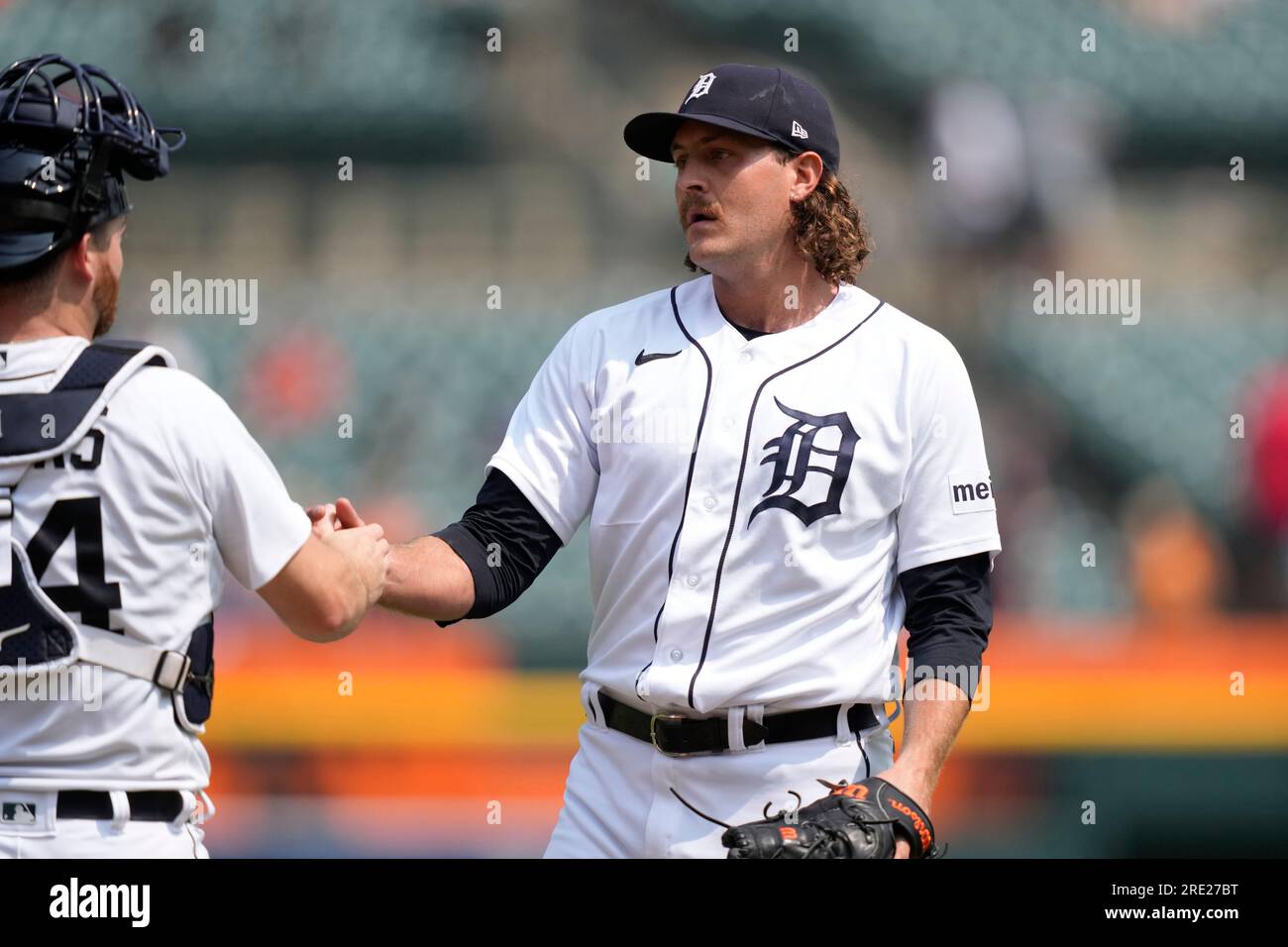 Detroit Tigers relief pitcher Jason Foley greets catcher Jake Rogers ...