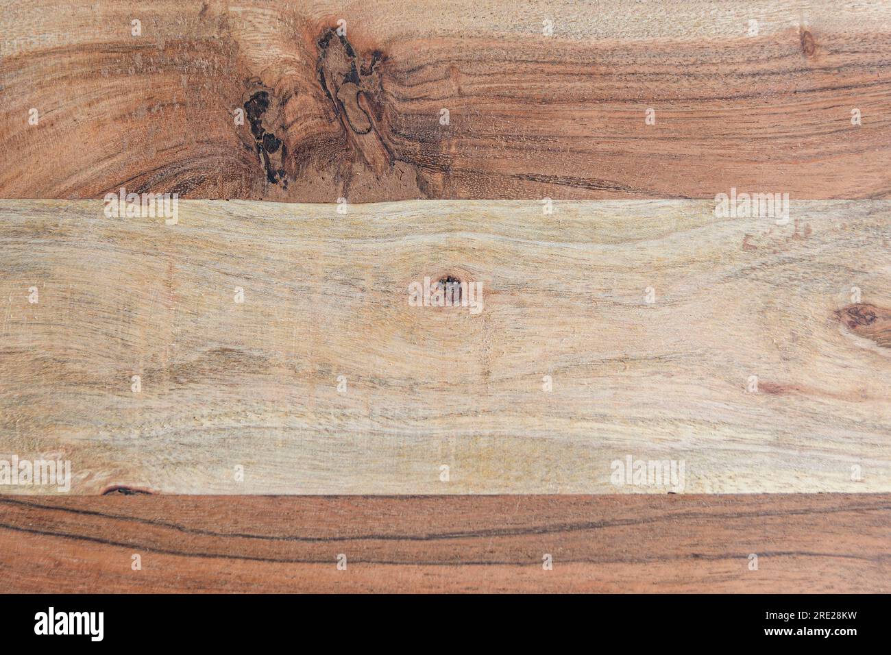 Cutting wooden board texture. hard transitions, saw cuts of knots. close up Stock Photo