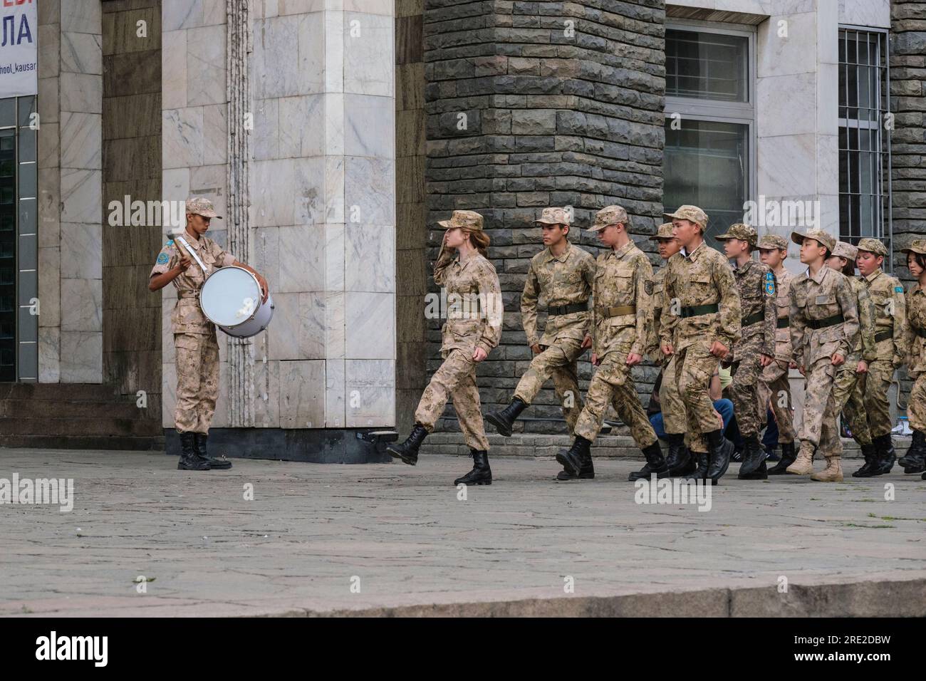 Kazakhstan, Almaty. Young Students Practicing Marching, Panfilov Guardsmen Park. Stock Photo