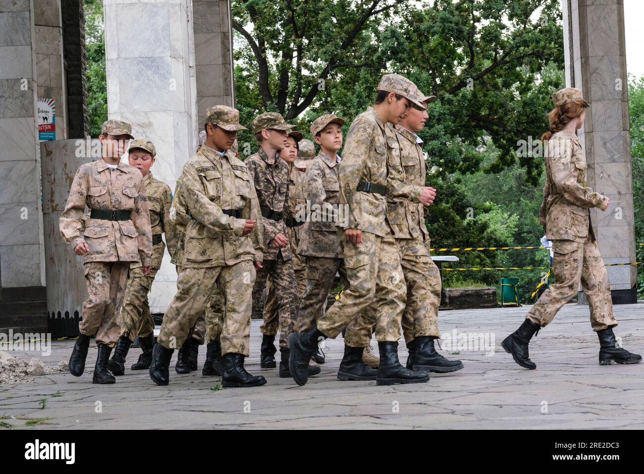 Kazakhstan, Almaty. Young Students Practicing Marching, Panfilov Guardsmen Park. Stock Photo