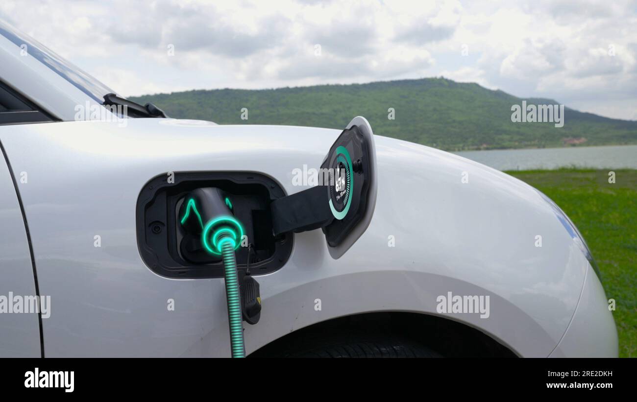 Electric car plug in with charging station, recharge battery by EV
