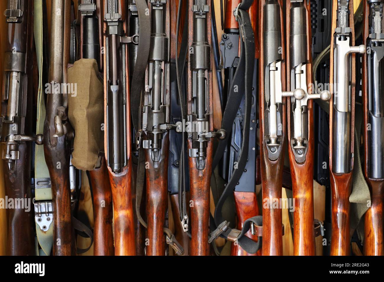 Automatic weapon collection, rifles and machine guns in gun cabinet Stock Photo