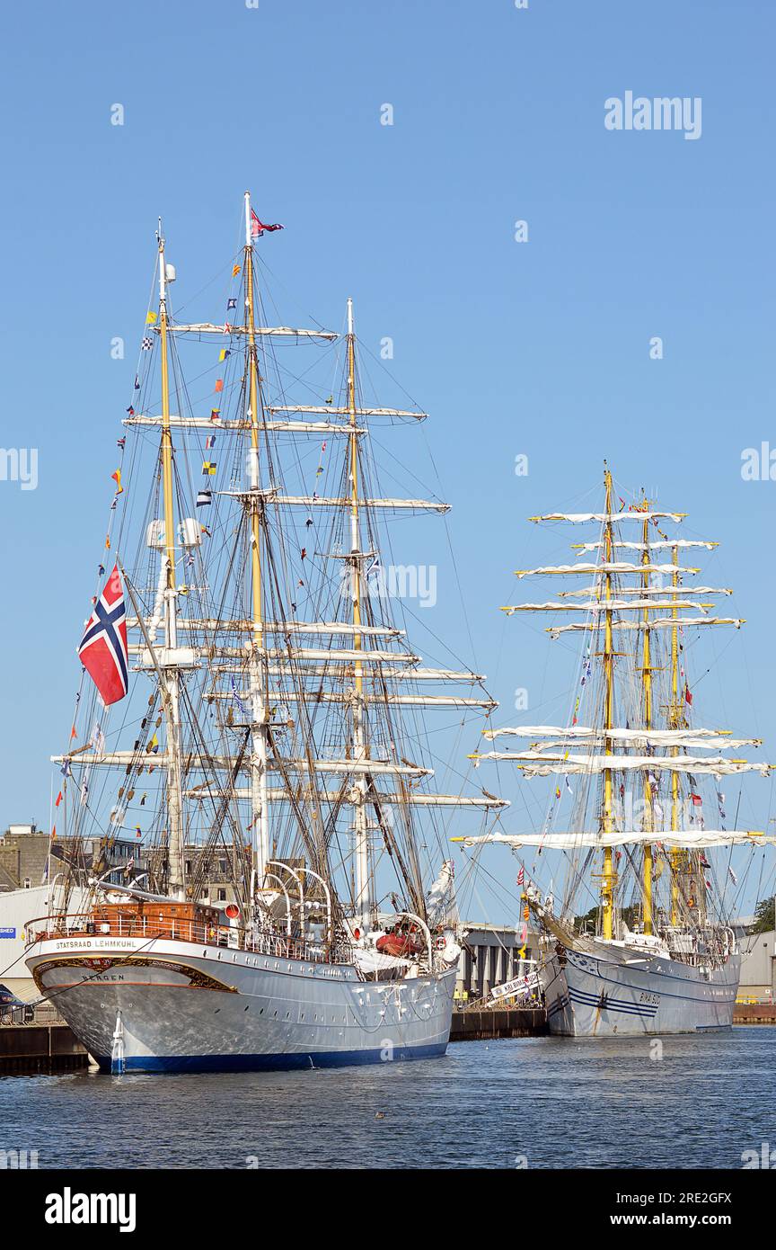 ABERDEEN, SCOTLAND - 22 JULY 2023: The Norwegian barque Statsraad Lehmkuhl and the Indonesian Navy's Bima Suci. training sailing ships tied up at the Stock Photo