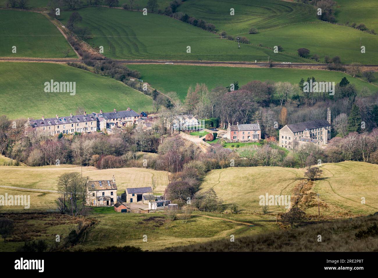 Aerial view of old stone cottages in a small village in Hope Valley