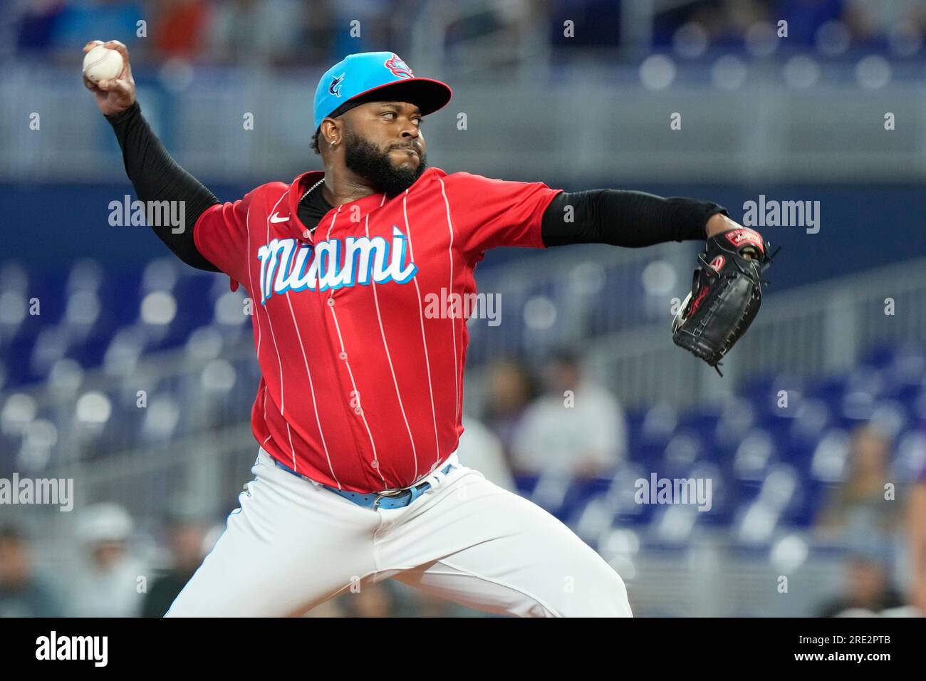 Miami Marlins starting pitcher Johnny Cueto aims a pitch during a