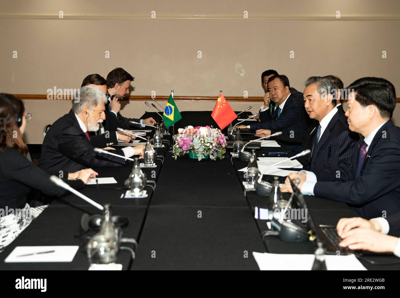 Johannesburg, South Africa. 24th July, 2023. Wang Yi (2nd R), director of the Office of the Communist Party of China Central Commission for Foreign Affairs, meets with Celso Luiz Nunes Amorim (2nd L), chief advisor of the Presidency of Brazil, in Johannesburg, South Africa, on July 24, 2023. Credit: Zhang Yudong/Xinhua/Alamy Live News Stock Photo