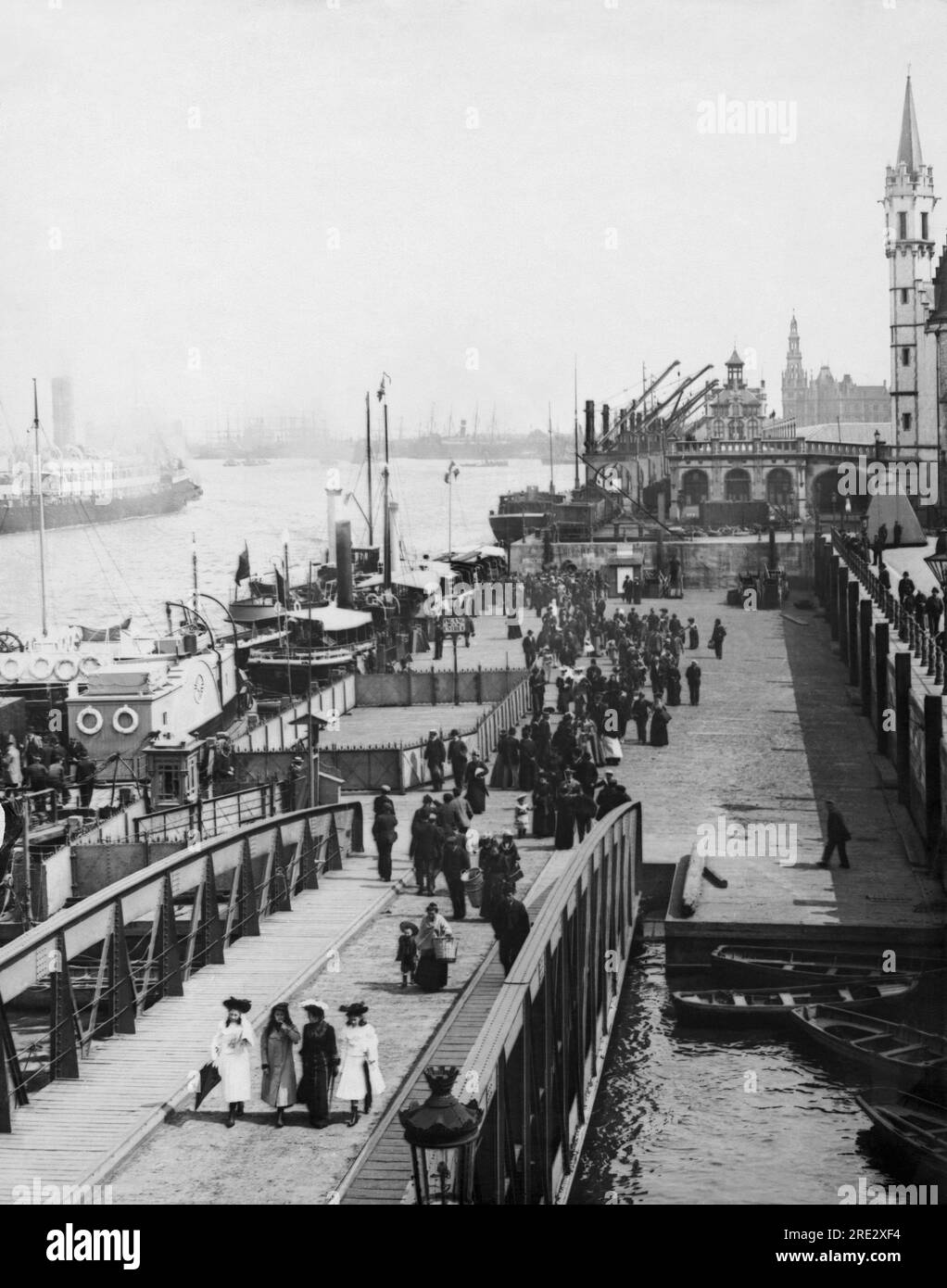 Antwerp, Belgium: c. 1900 The docks and promenade along the River ...