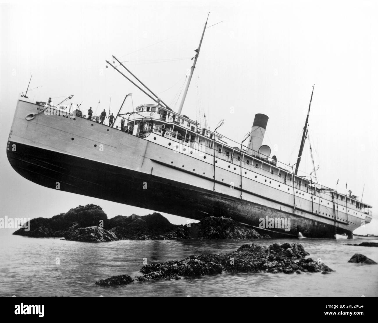 Sentinel Island, Alaska:  August 8, 1910. Canadian Pacific Raiway coastal liner, the S.S. Princess May after she ran aground at high tide in 1910 off Sentinel Island in Alaska. She was carrying 148 crew and passengers plus a shipment of gold and mail. All were rescued, and the ship was salvaged. Stock Photo