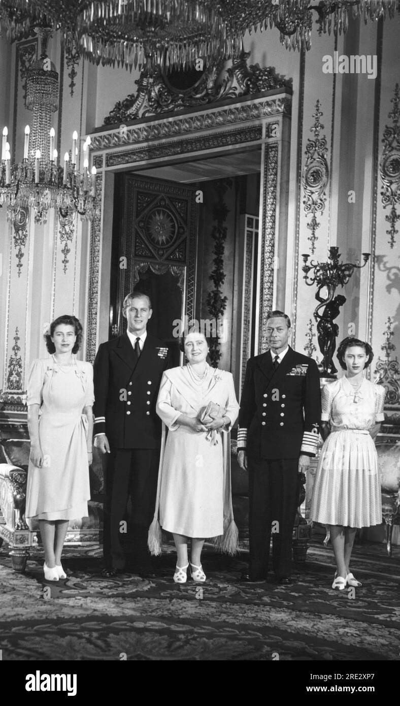 London, England:    September 15, 1947 The Royal Family prepares for the wedding of Princess Elizabeth and Phillip Mountbatten. L-R: Princess Elizabeth, Lt. Mountbattten, Queen Elizabeth, King George, and Princess Margaret Rose. Stock Photo