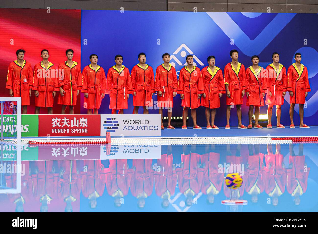 FUKUOKA, JAPAN - JULY 25: Honghui Wu of China, Zhangxin Hu of China, Chenghao Chu of China, Jiahao Peng of China, Jinpeng Zhang of China, Zekai Xie of China, Zhongxian Chen of China, Rui Chen of China, Yimin Chen of China, Yu Liu of China, Chufeng Zhang of China, Dingsong Shen of China, Zhiwei Liang of China during the national anthem during the World Aquatics Championships 2023 Men's Waterpolo classification 15th-16th place match between China and South Africa on July 25, 2023 in Fukuoka, Japan (Photo by Albert ten Hove/Orange Pictures) Stock Photo