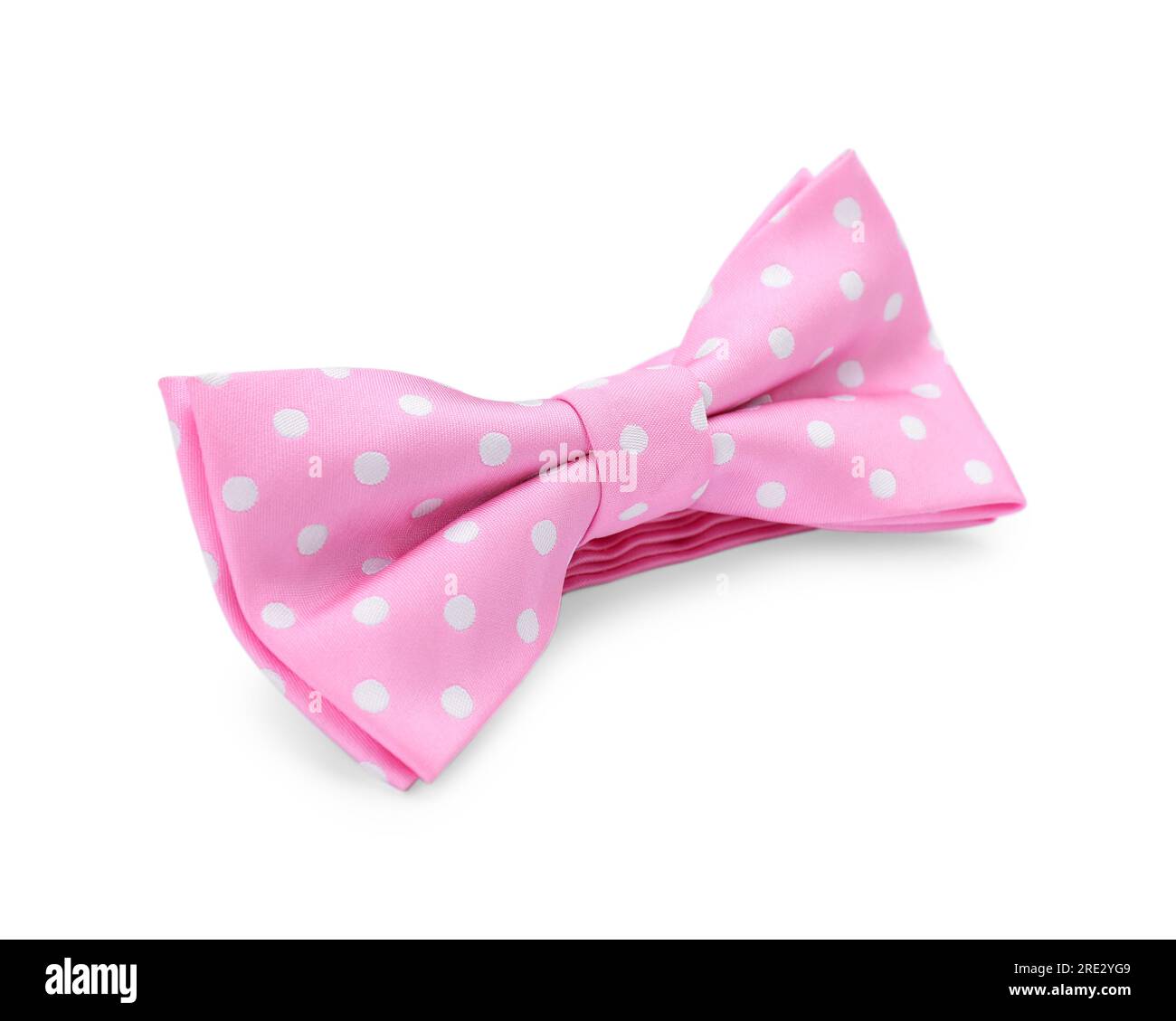 Stylish pink bow tie with polka dot pattern on white background Stock Photo