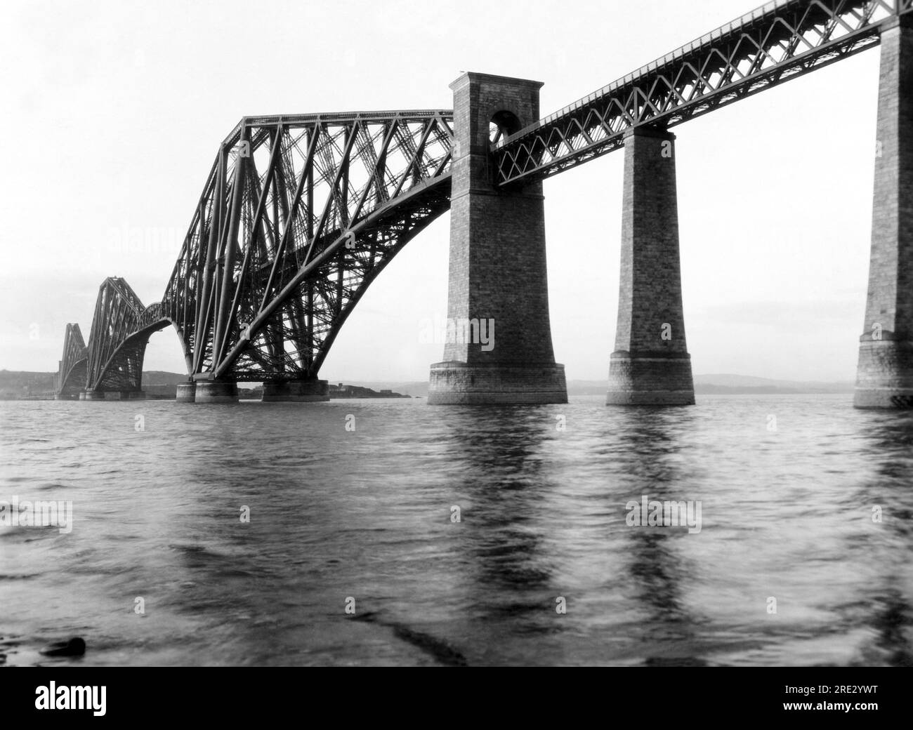 Edinburgh, Scotland, UK: c. 1922 The Forth Bridge across the Firth of Forth near Queens Ferry in Scotland. Stock Photo