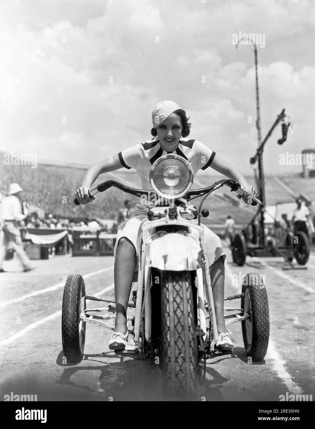 Hollywood, California: 1932. Susan Fleming takes a ride on a three ...