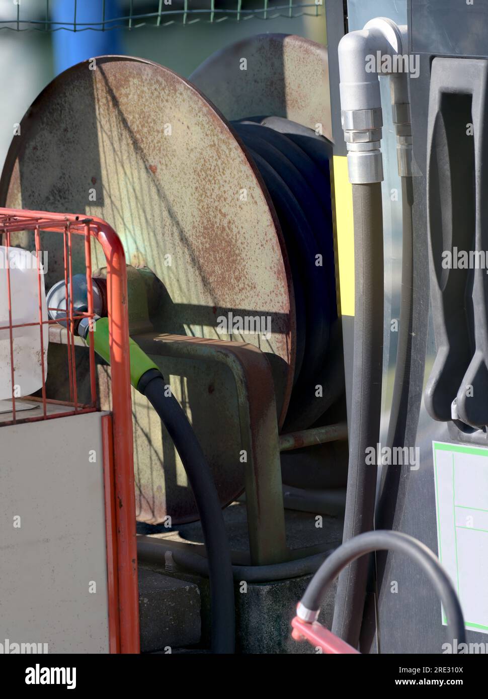 Close up of fuel pump at ship fueling station at small harbor with