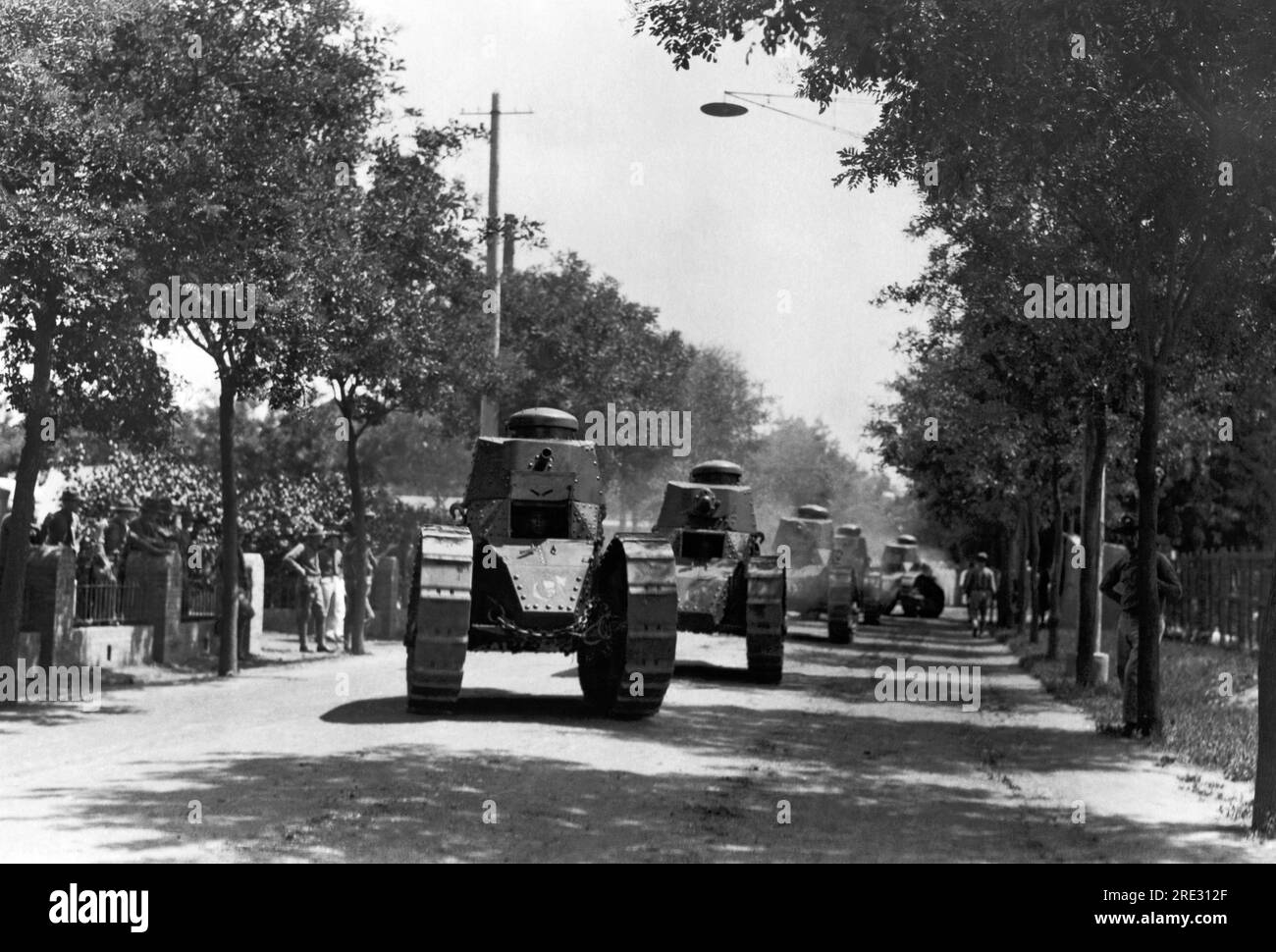 Tientsin, China:  September 20, 1927 United States Marine Corps tanks traveling down a road in Tientsin. Stock Photo