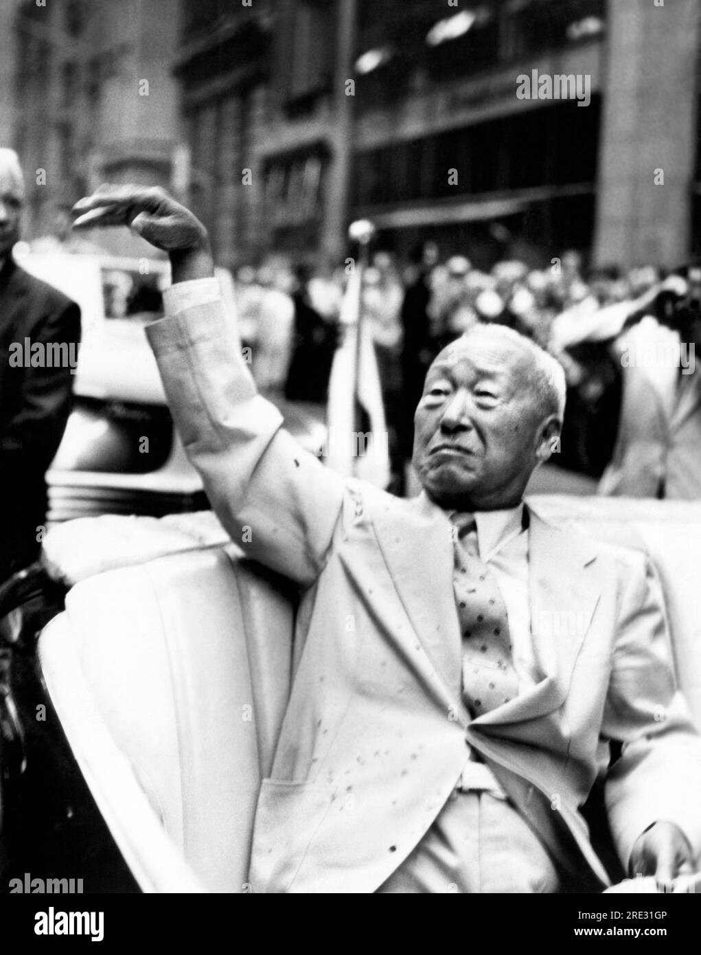 New York, New York:    August 2, 1954 President Syngman Rhee of Korea rides in a covertible in a ticker tape parade reception for him. Stock Photo