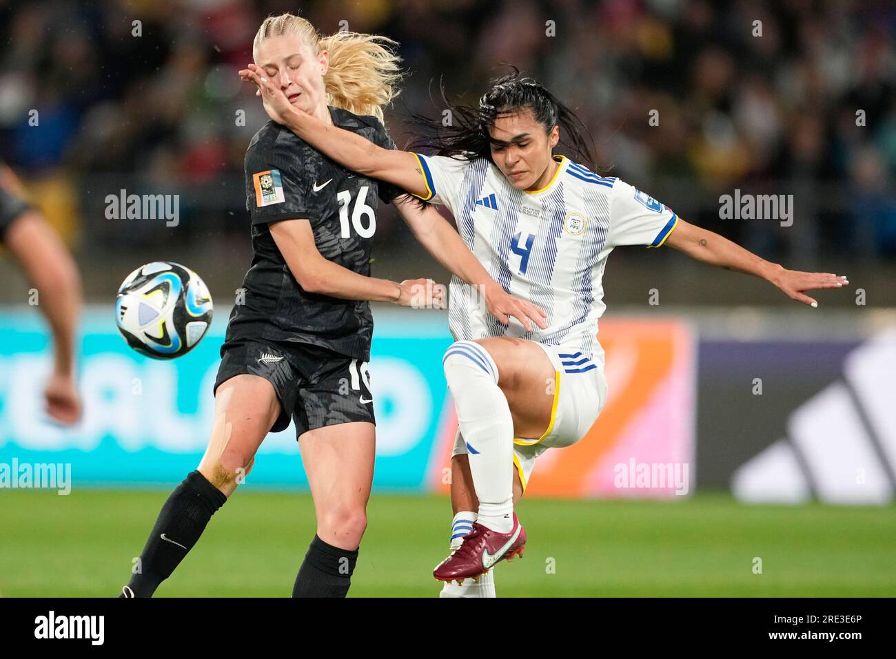 New Zealand's Jacqui Hand, left, and Philippines' Jaclyn Sawicki battle ...