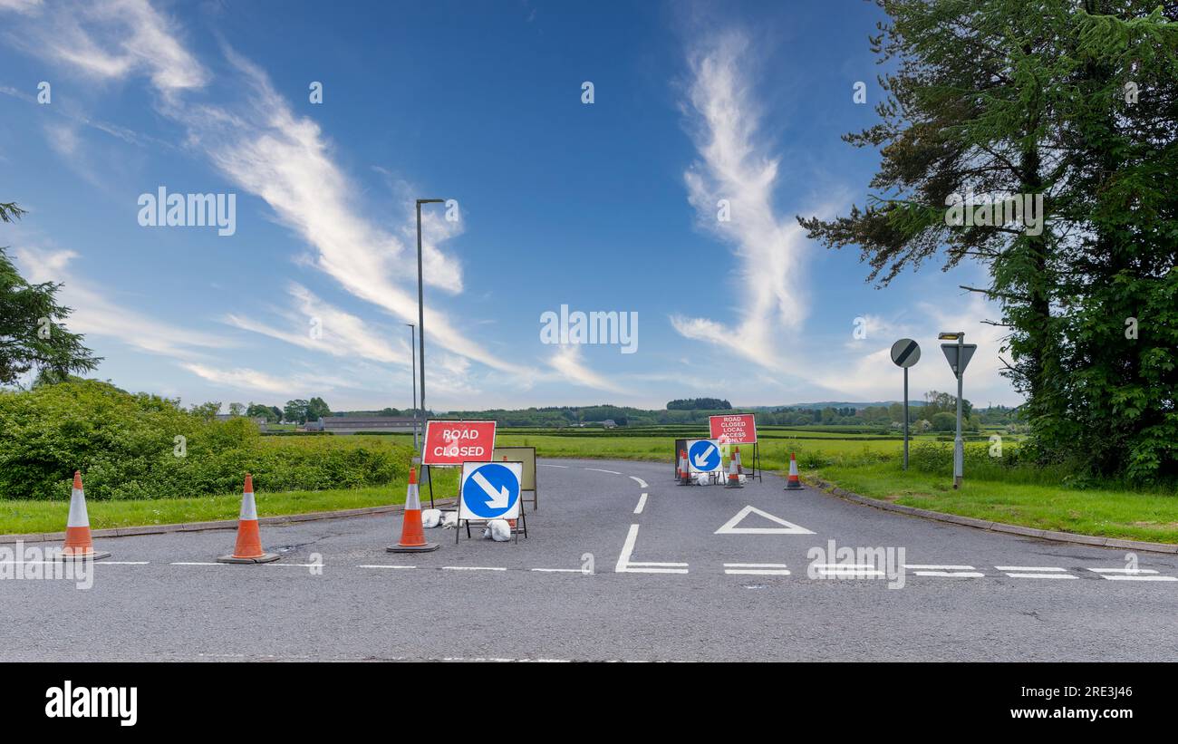 Country Road Closed for access with the normal Road Closure signs at the junction with cones and