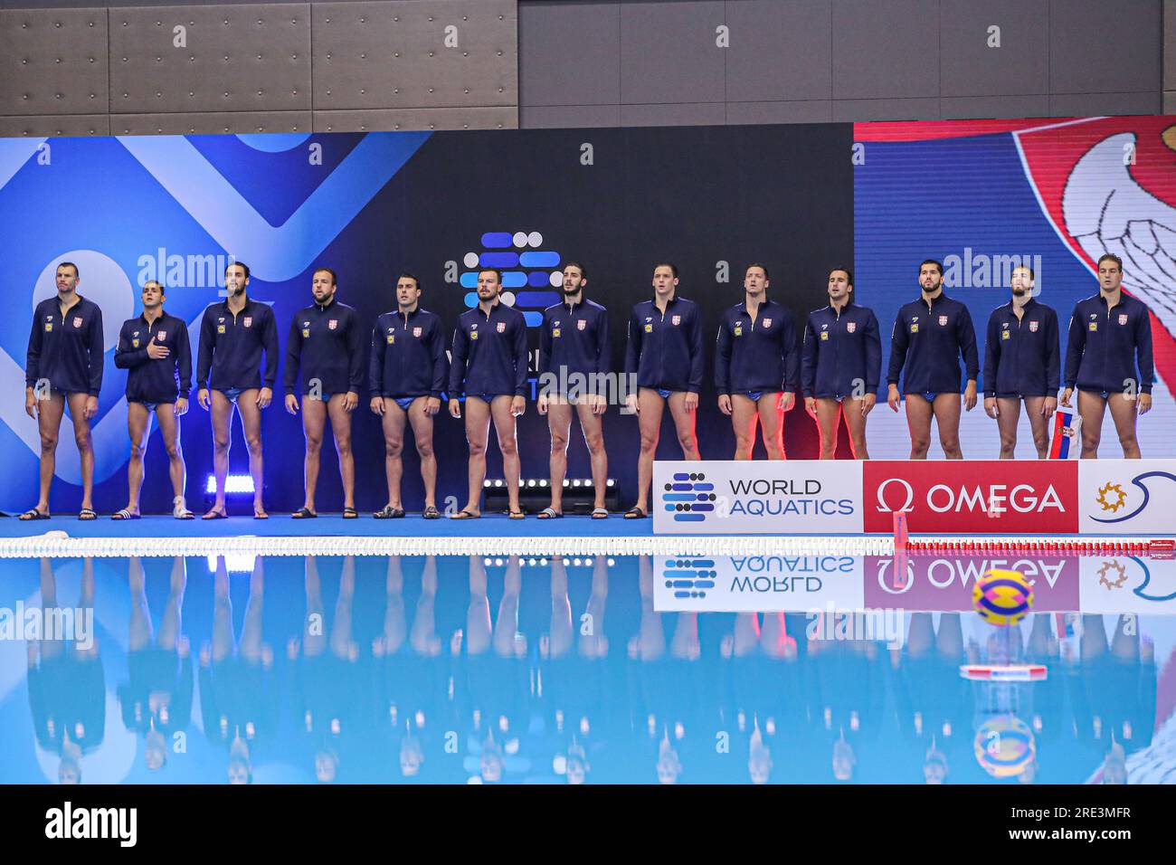 FUKUOKA, JAPAN - JULY 25: Vladimir Misovic of Serbia, Marko Radulovic of Serbia, Strahinja Rasovic of Serbia, Sava Randelovic of Serbia, Pavle Gavrilovic of Serbia, Vuk Milojevic of Serbia, Radomir Drasovic of Serbia, Nikola Jaksic of Serbia, Filip Jankovic of Serbia, Nemanja Ubovic of Serbia, Djordje Vucinic of Serbia, Vasilije Martinovic of Serbia, Branislav Mitrovic of Serbia during the national anthem during the World Aquatics Championships 2023 Men's Waterpolo Quarterfinal match between Italy and Serbia on July 25, 2023 in Fukuoka, Japan (Photo by Albert ten Hove/Orange Pictures) Stock Photo