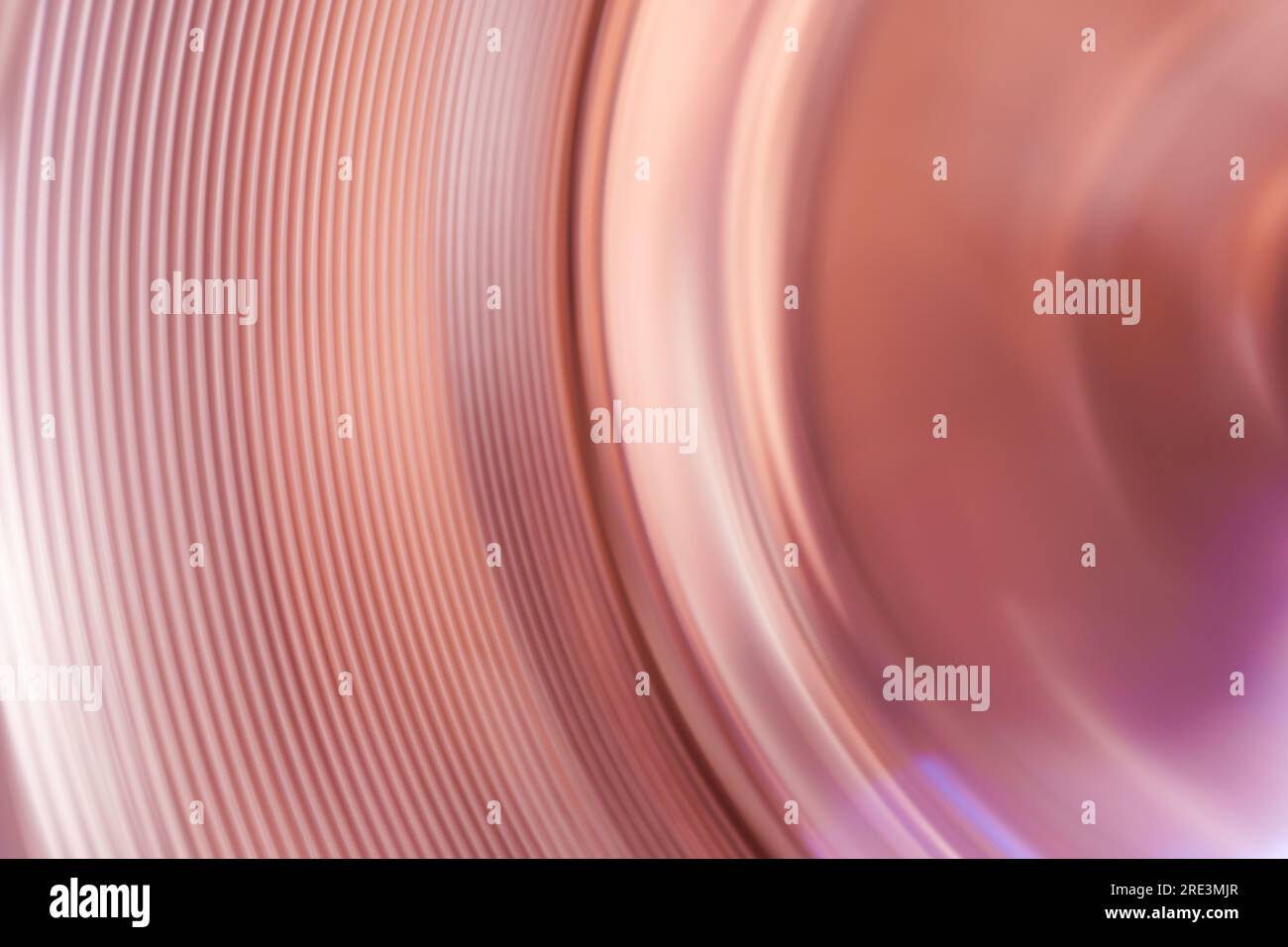 Abstract spinning pink light trails background Stock Photo