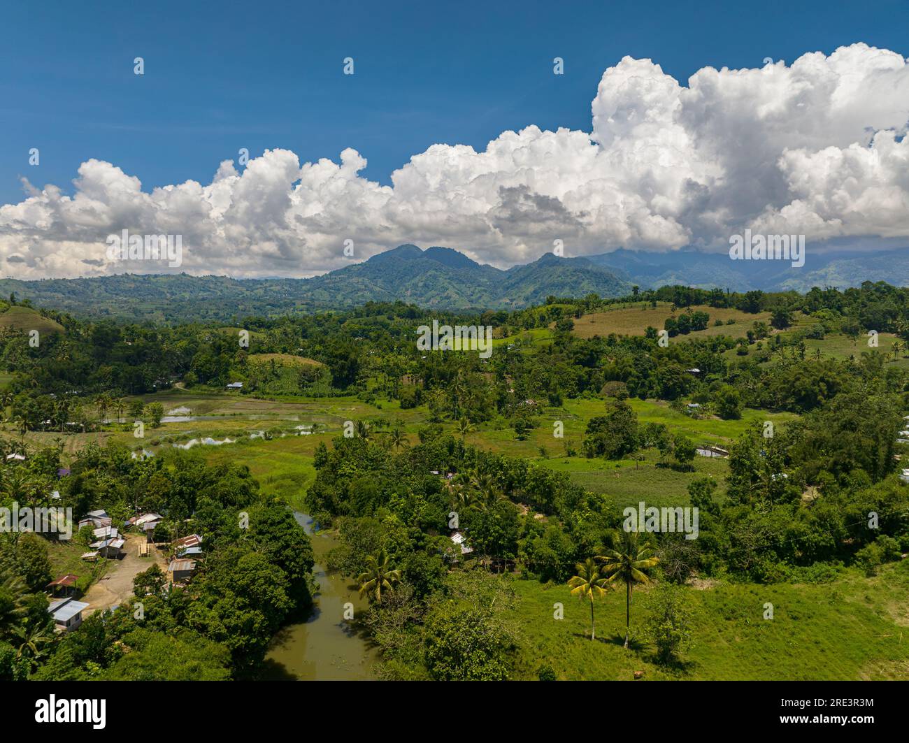 Top view of mountains with green forests and agricultural land with farm plantations. Mindanao, Philippines Stock Photo