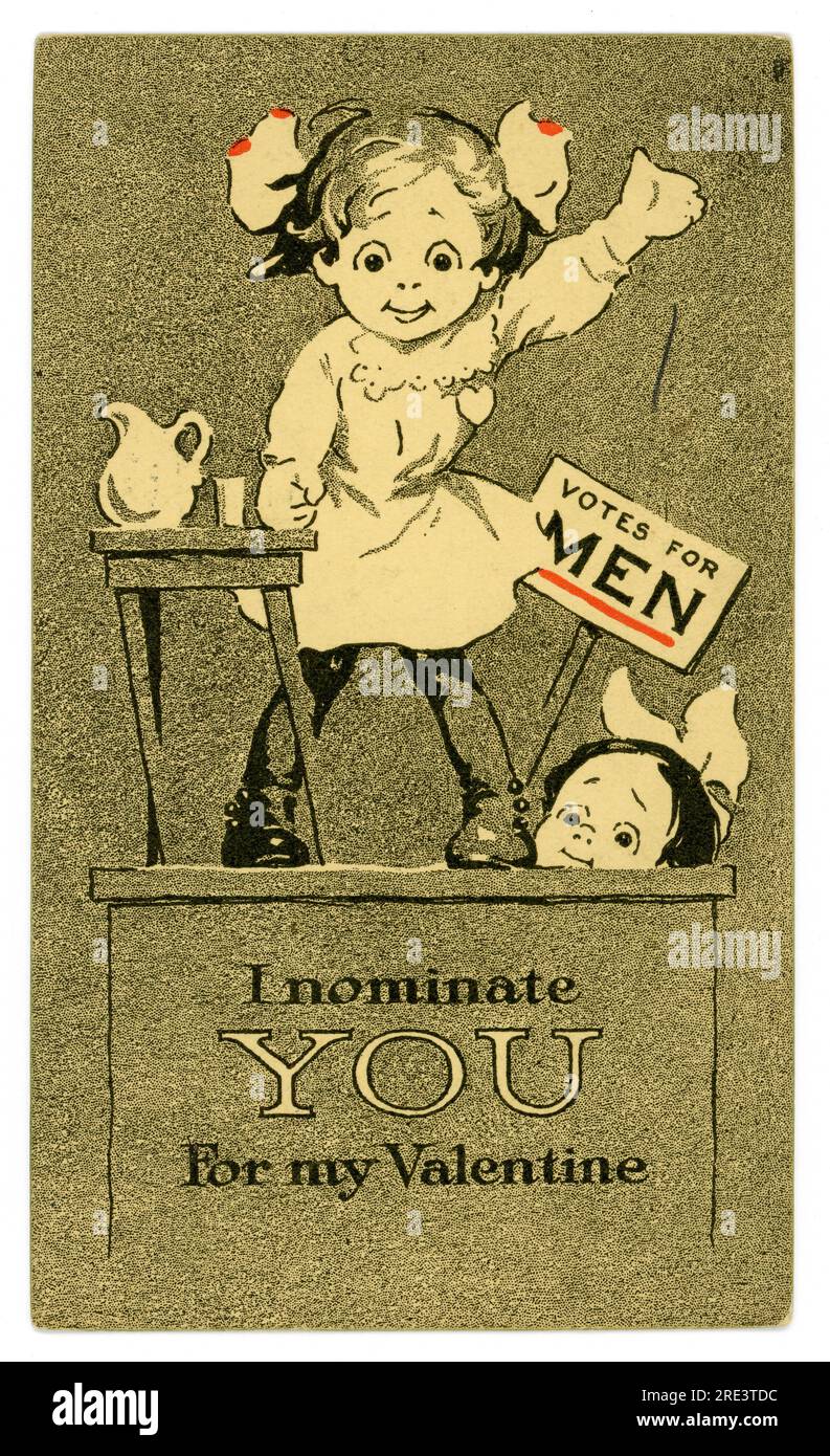 Original early 1900's, Titanic era suffragette themed cartoon postcard, 'Votes for Men, I nominate you for my Valentine'. A child is on a podium  depicted as a suffragette campaigner rallying her supporters and demanding the right to vote for women, whilst a timid looking girl holds up a banner behind her saying votes for men. Published by: A.M. Davis Co. Boston, Feb 13 1912 Stock Photo
