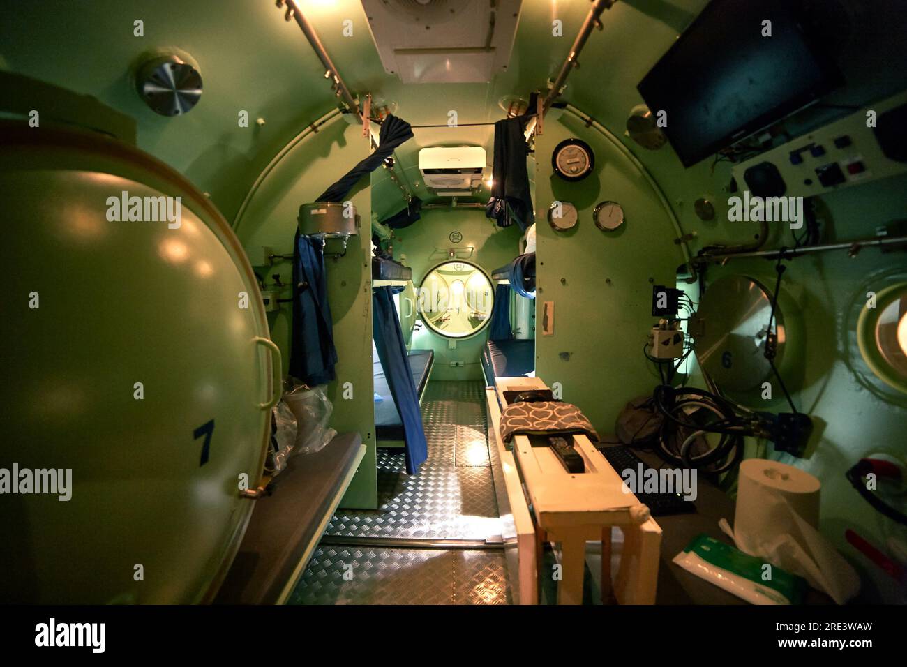Inside the divers chamber, bed room Stock Photo Alamy