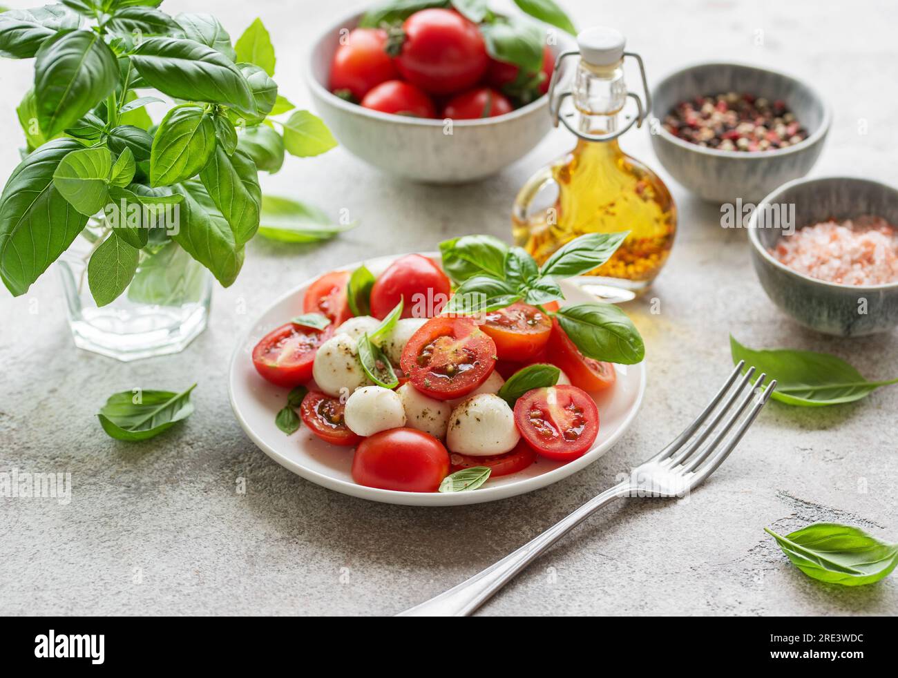 Caprese salad with tomatoes, mozzarella and basil. Healthy food Stock