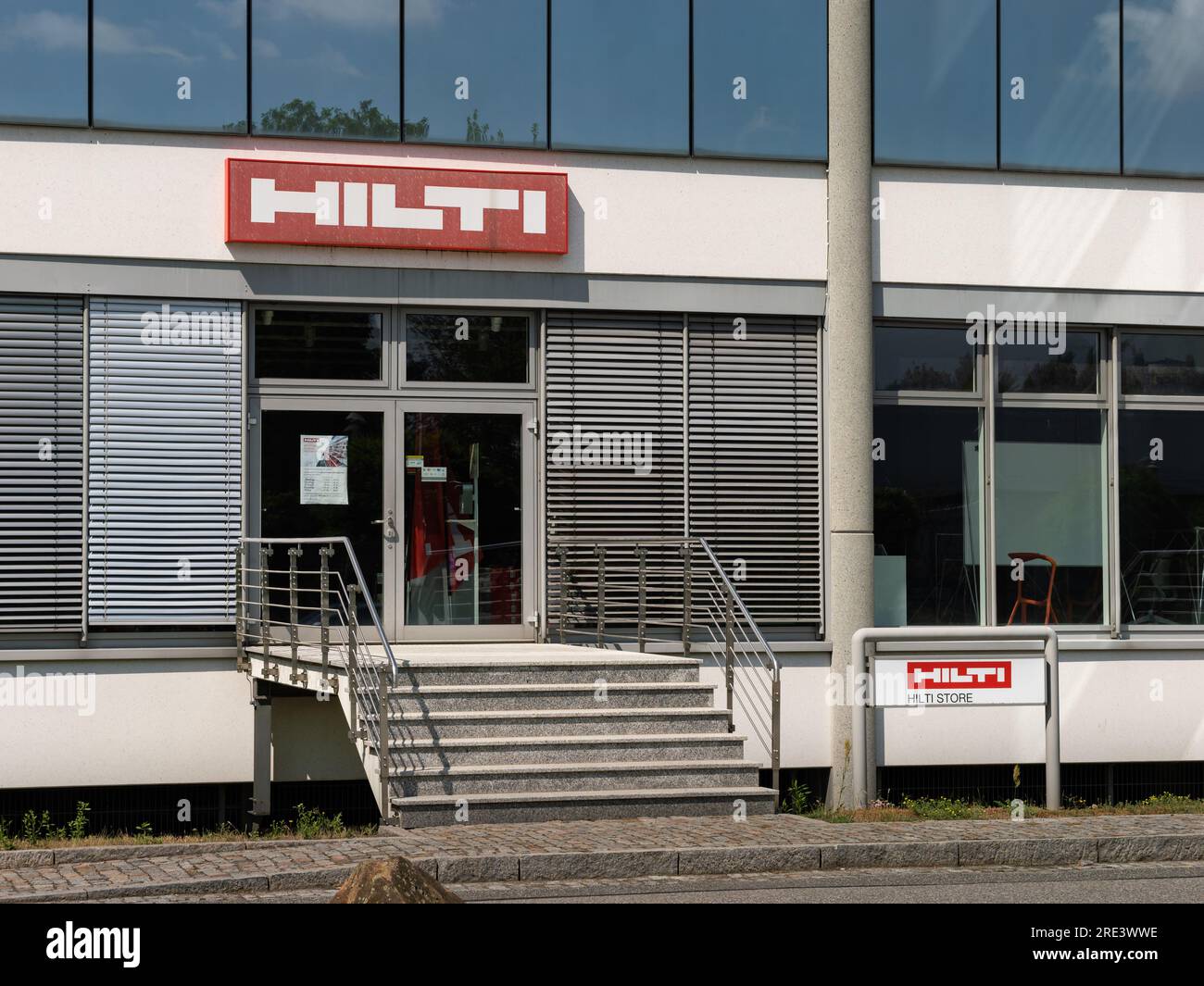 Hilti store with logos on the building exterior. The shop for