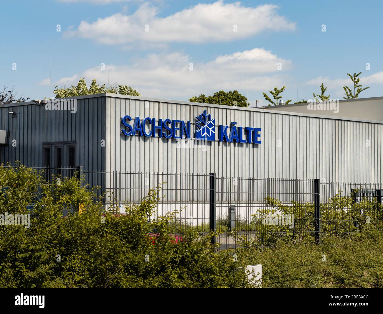 Sachsen Kälte company logo sign on the building exterior. The business offers solutions in refrigeration technology and air conditioners. Stock Photo