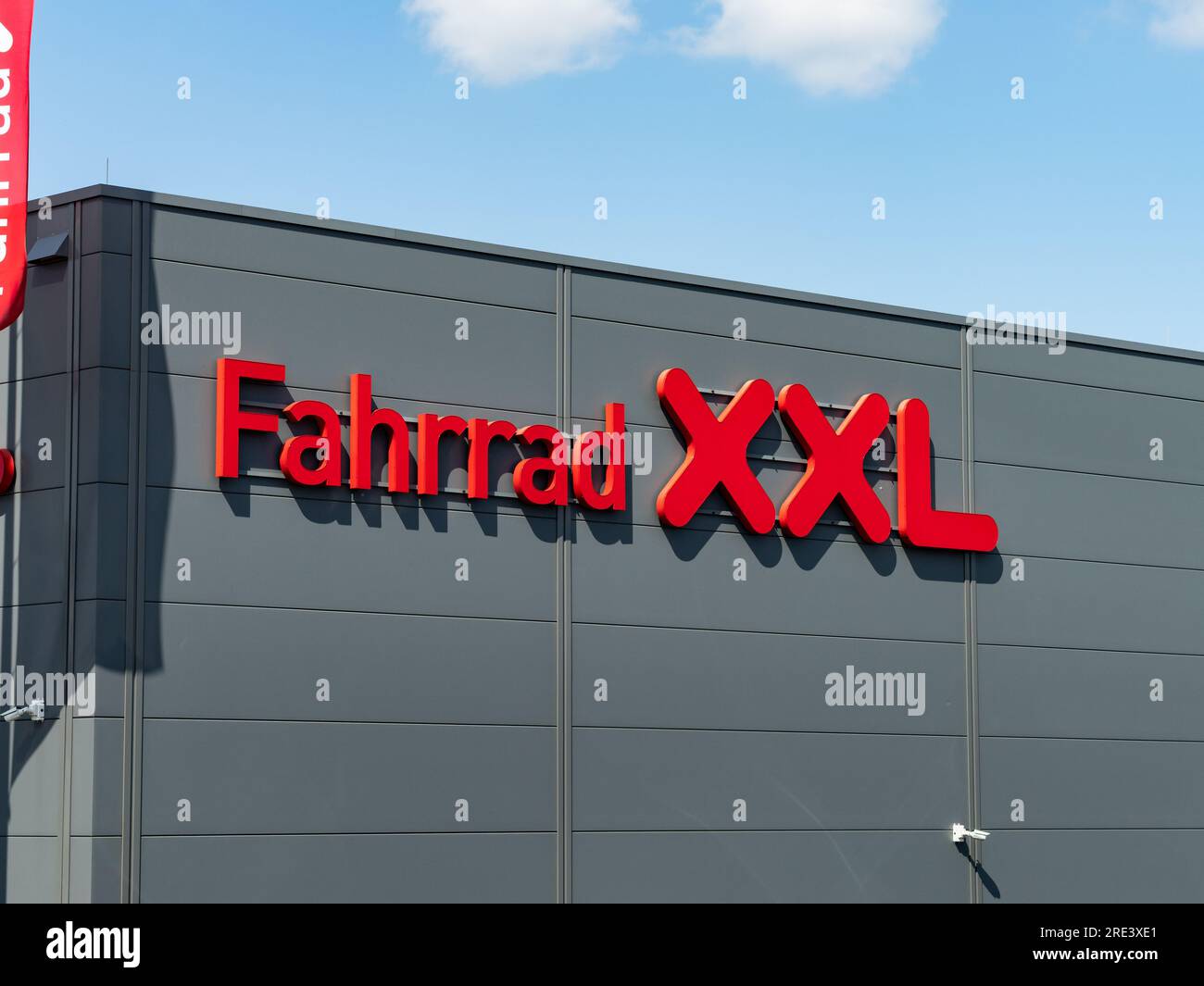 Fahrrad XXL logo sign on a retail store building exterior. The shop for bicycles, bike components, sports clothing and accessories has many products. Stock Photo