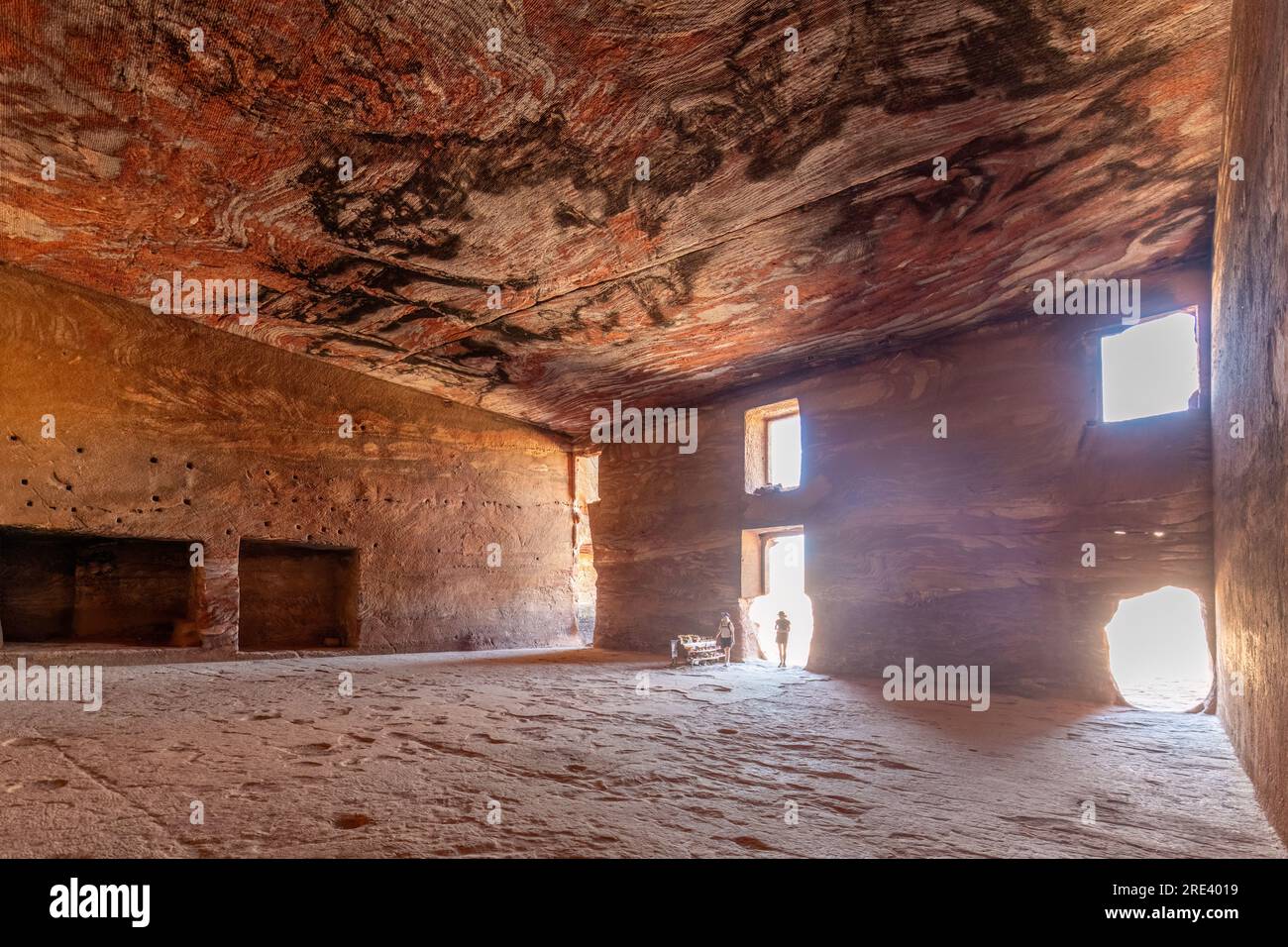 Inside the carved out interior of the Urn Tomb in Petra, Jordan. Stock Photo