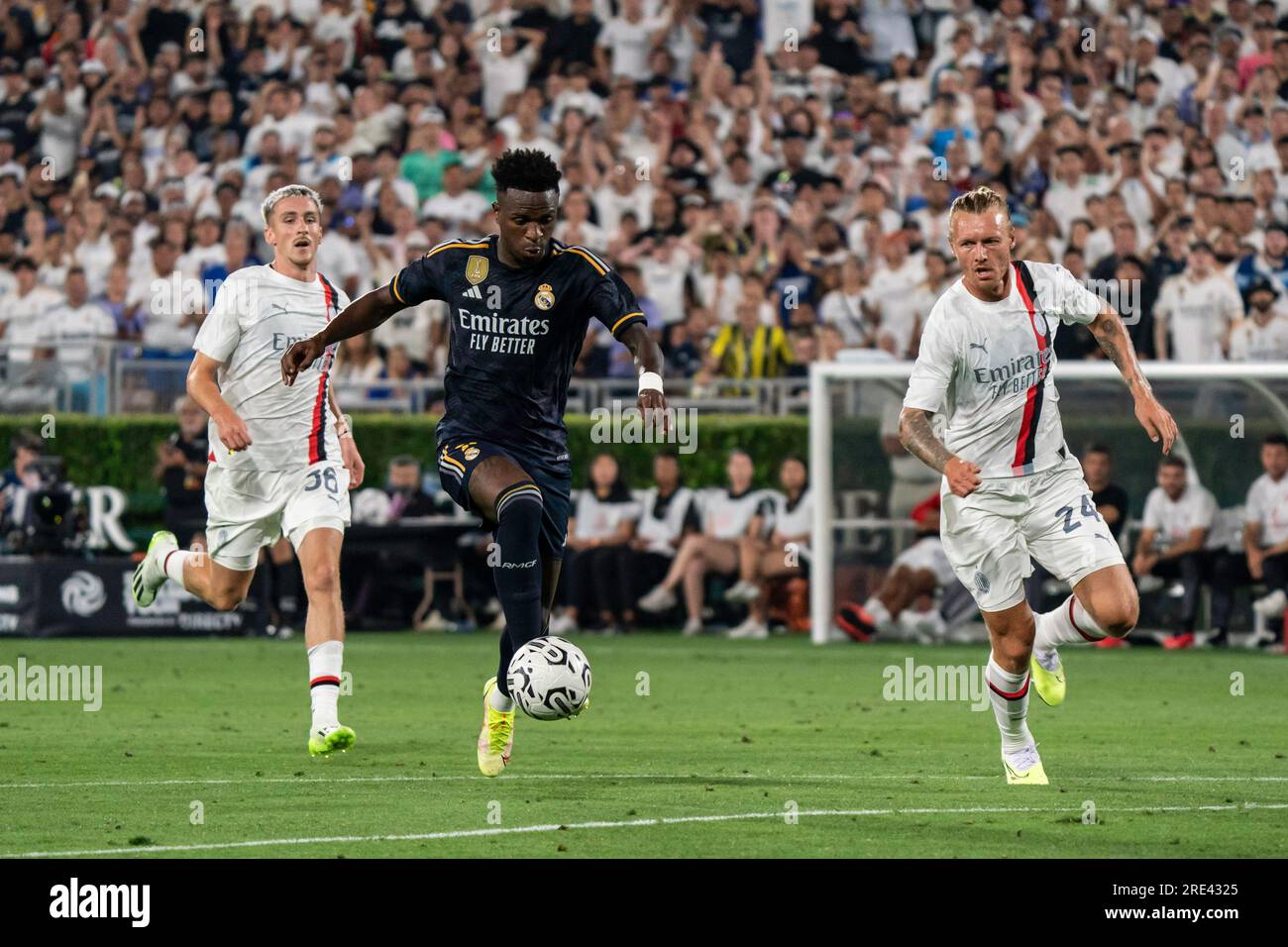 Real Madrid forward Vinícius Júnior (7) gains possession against Milan defender Simon Kjær (24) during the Soccer Champions Tour, Sunday, July 23, 202 Stock Photo