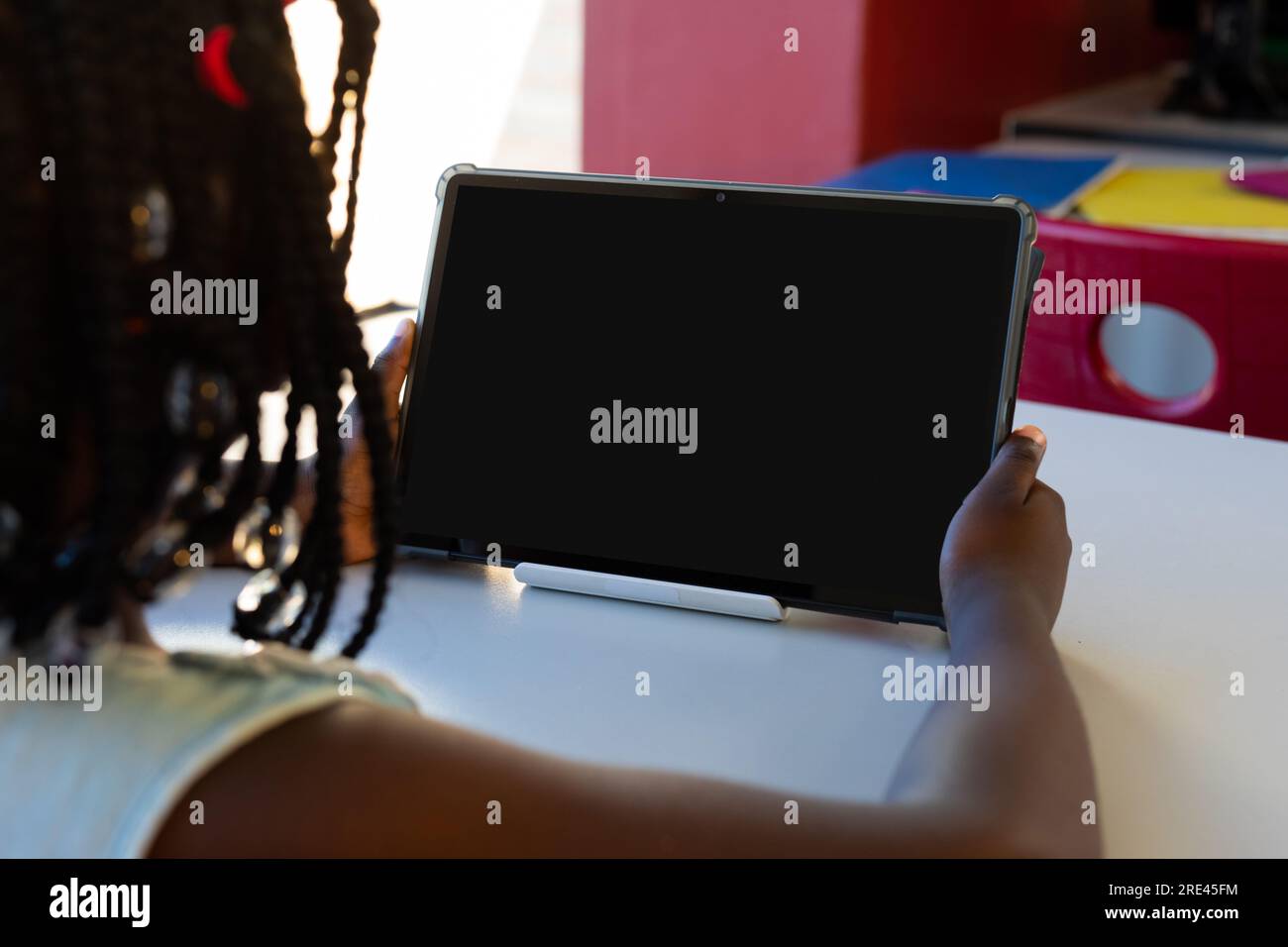 Girl at school tablet hi-res stock photography and images - Alamy