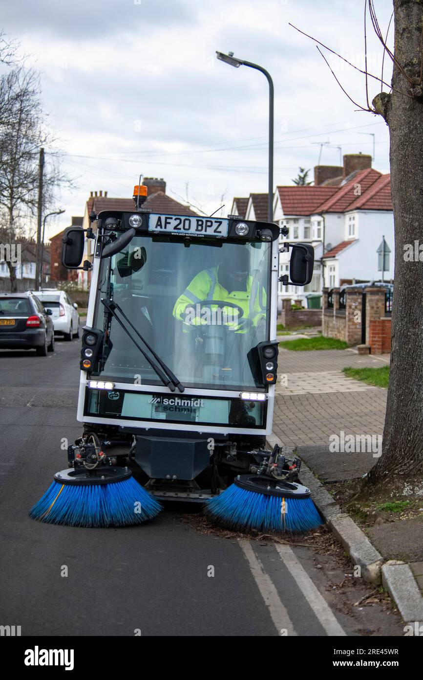 Electric road sweeper from manufacturer Aebi Schmidt in Harrow streets Feb2022 Stock Photo