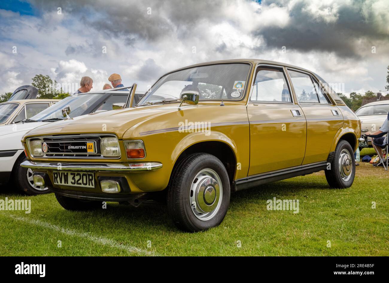 A gold-coloured 1976 Austin Allegro 1300SDL saloon car on display at a classic car show in Storrington, West Sussex, UK. Stock Photo