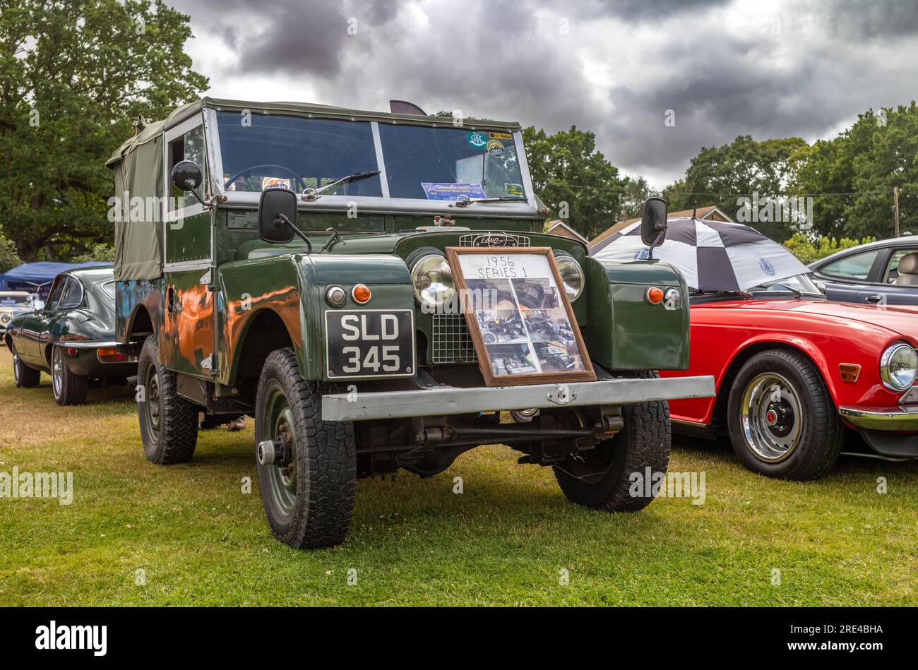 A 1956 Series 1 Land Rover car with its sturdy chassis and green aluminium body on display at a classic car show in Storrington, West Sussex, UK. Stock Photo