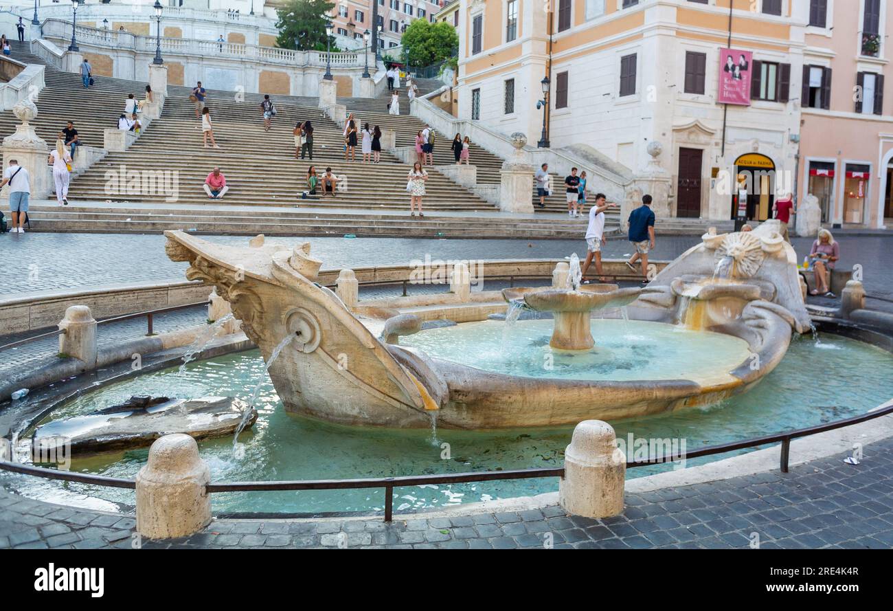Rome, Lazio, Italy, Tourists around Fontana della Barcaccia at Piazza di Spagna Stock Photo
