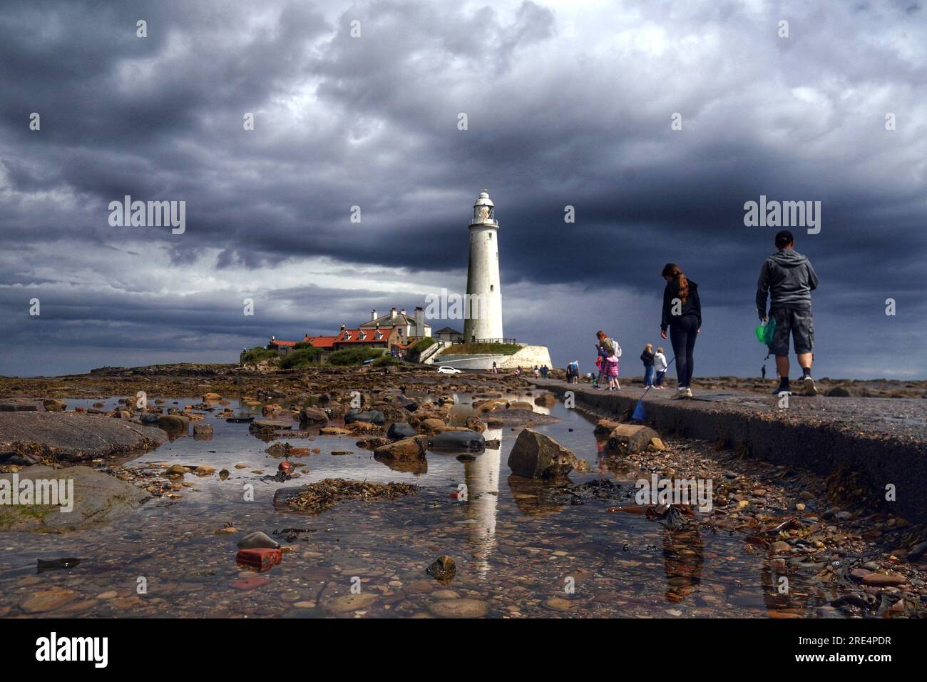 July Lighthouse Storm clouds gather over St Mary's Lighthouse in Whitley Bay on the ...