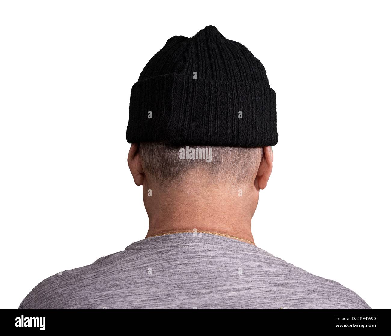 a man seen from behind with a black wool cap Stock Photo