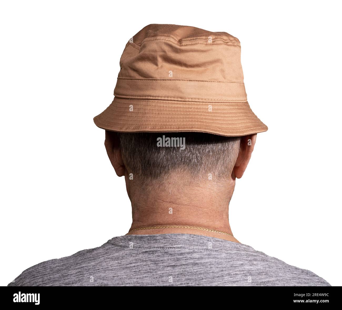 a man seen from behind with a brown hat Stock Photo