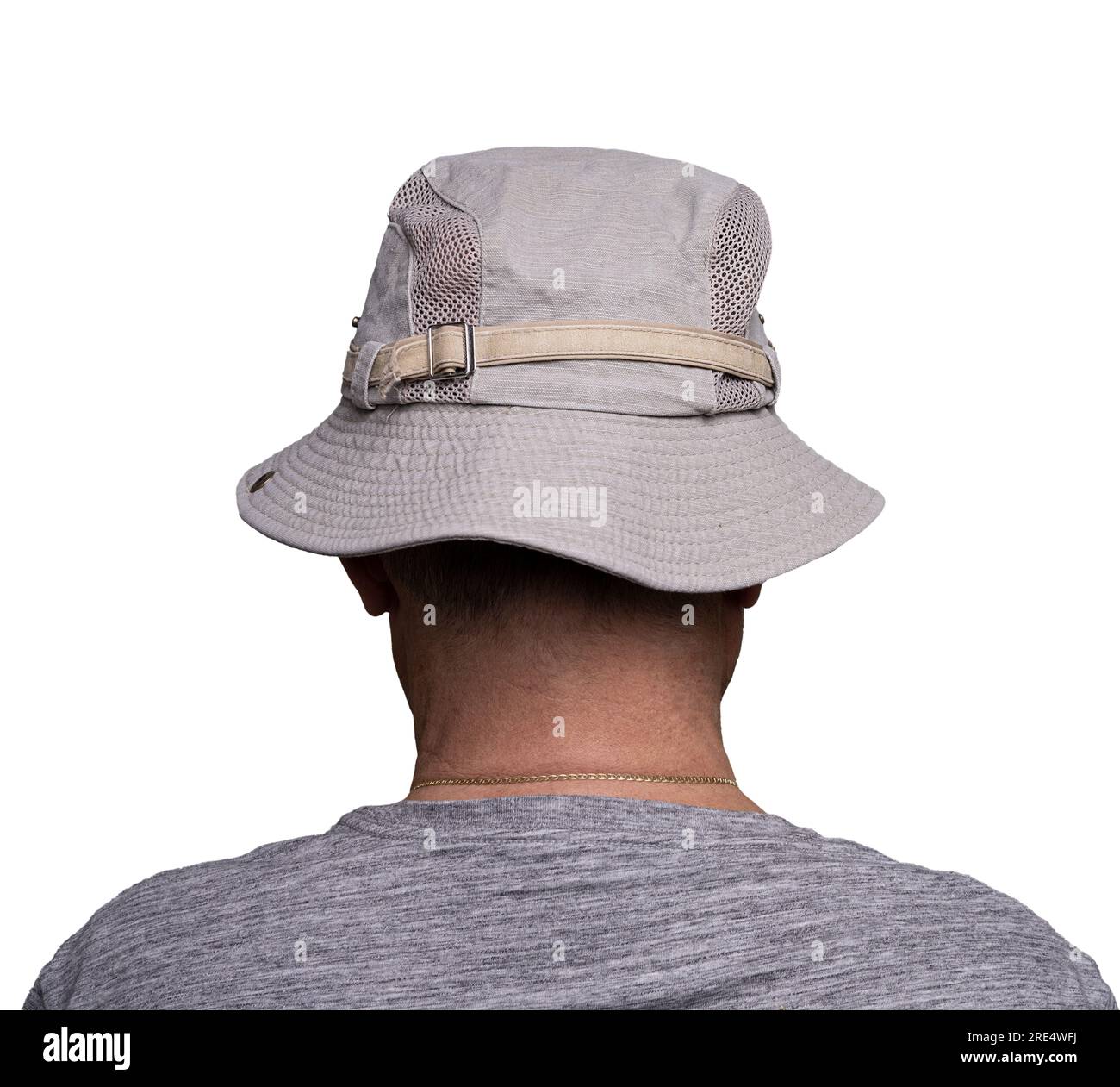a man from behind with a wide-brimmed beige hat Stock Photo