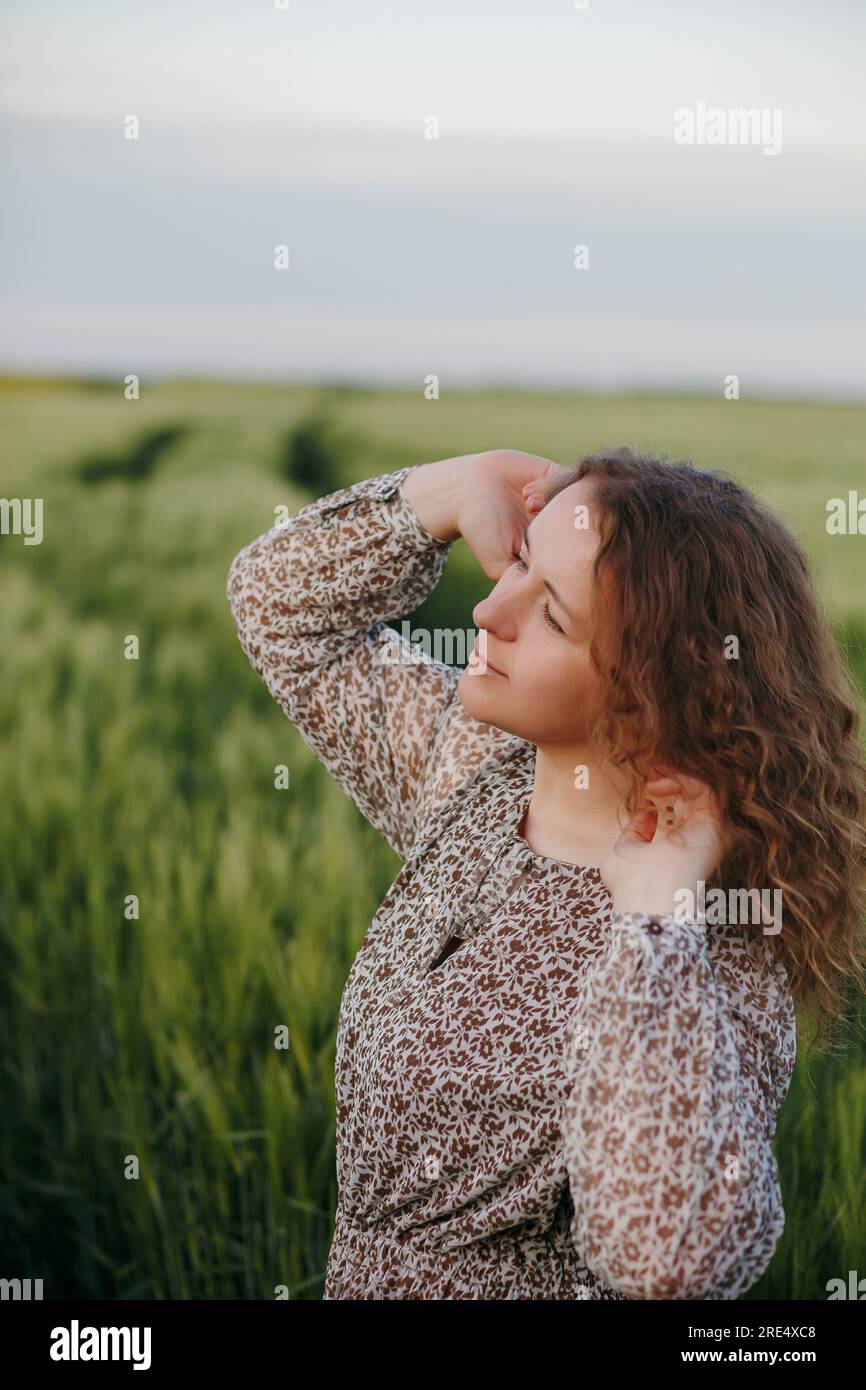 Portrait of cute girl with green background Stock Photo - Alamy