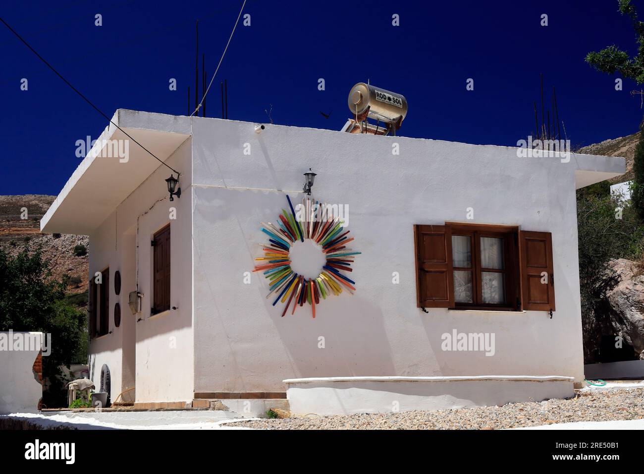 Traditional style village house, whitewashed. Tilos island, near Rhodes,  Dodecanese, Greece Stock Photo