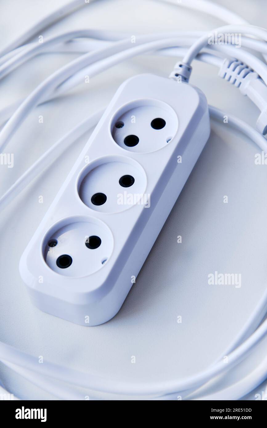 White electric extension cord, great design for any purposes. White  background. Network extension cord Stock Photo - Alamy, image size:867x1390