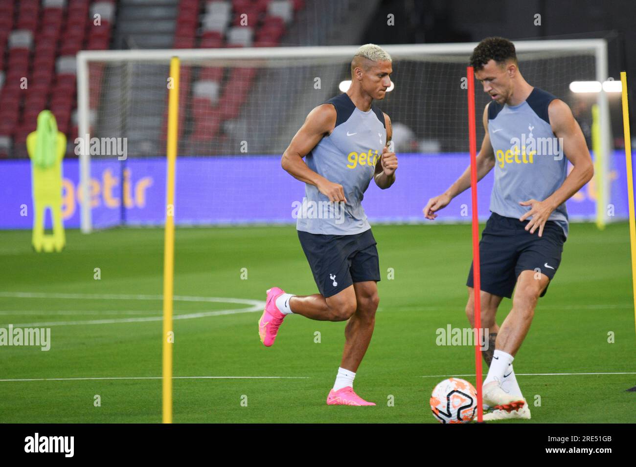 Singapore. 25th July, 2023. Richarlison (L) and Ivan Perisic of Tottenham Hotspur attend the open training session at the Singapore Festival of Football held in the National Stadium in Singapore, July 25, 2023. Credit: Then Chih Wey/Xinhua/Alamy Live News Stock Photo