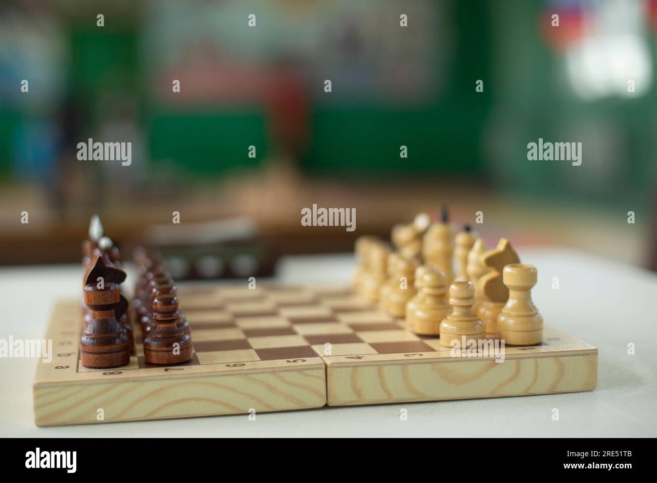 Chess pieces on table. Chess Tournament. Ancient Strategy. Game figures