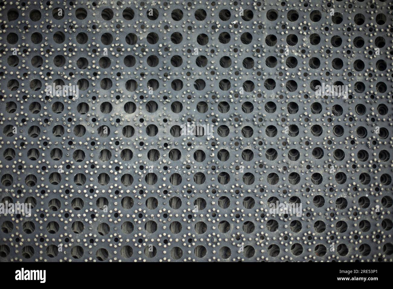 Rubber mat. Texture of machine mat. Surface for collecting dirt from