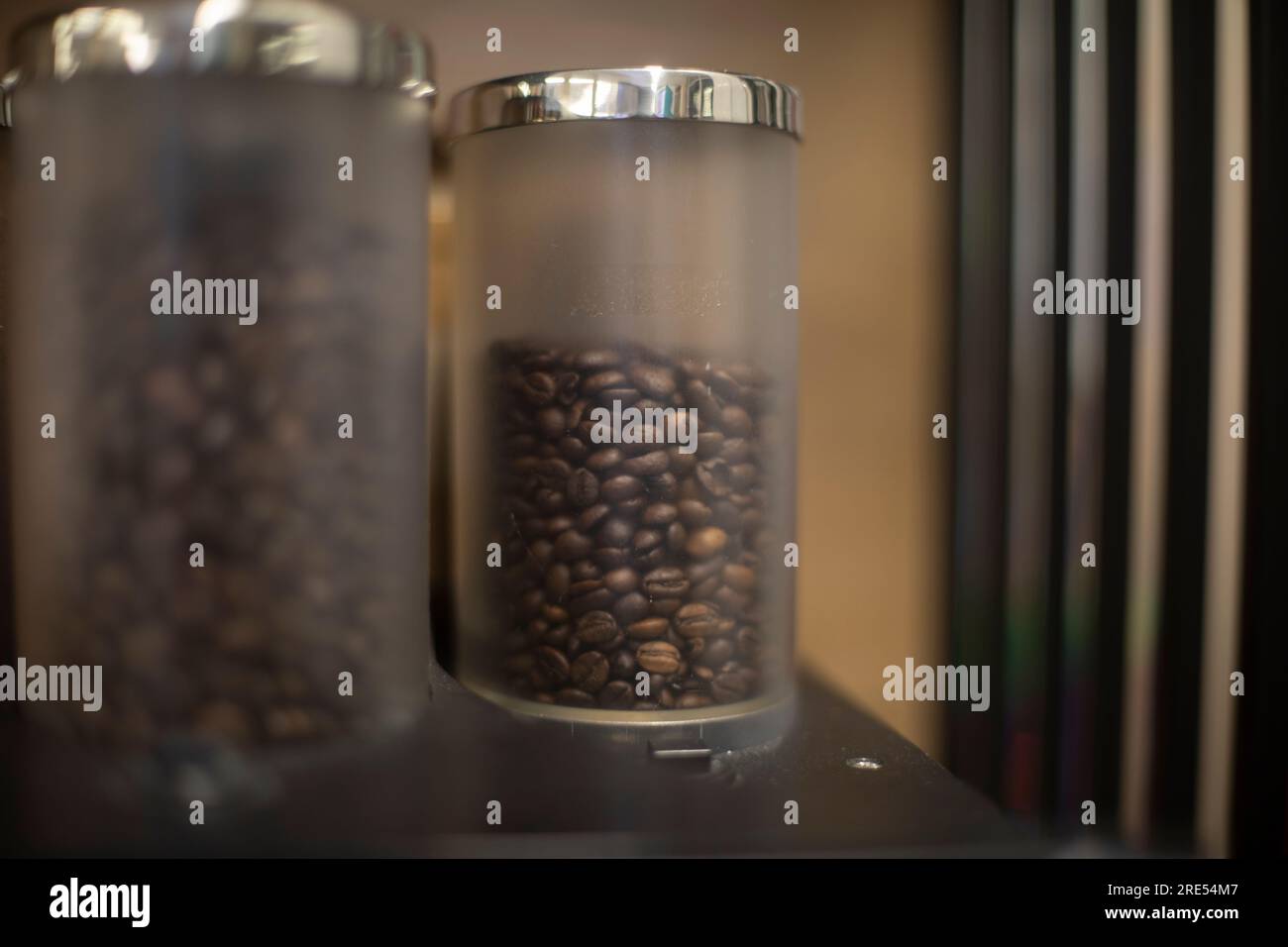 Coffee machine. Coffee beans loaded into coffee maker. Preparation of