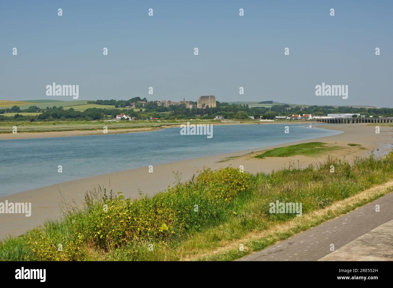 River Adur at low tide. Shoreham in West Sussex, England. With Lancing college and old wooden bridge in background. Stock Photo